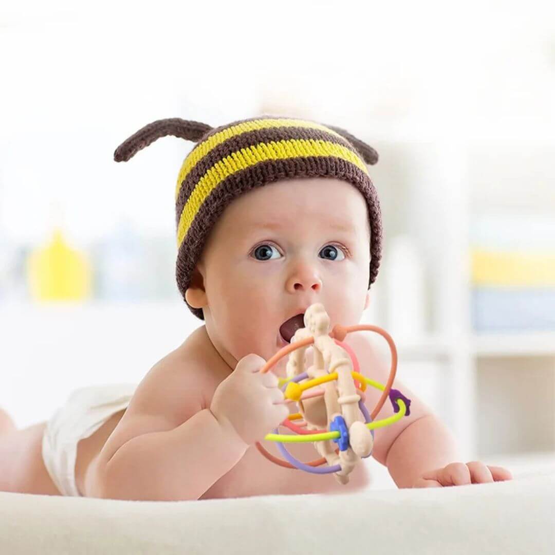 Hochet pour bebe anneau Manhattan couleurs vives
