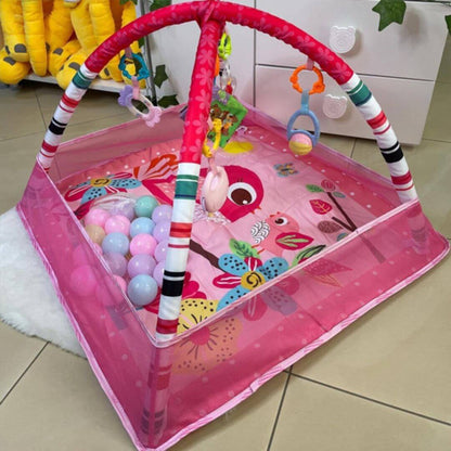 Arche-d'éveil-rose-pastel-aire-de-jeu