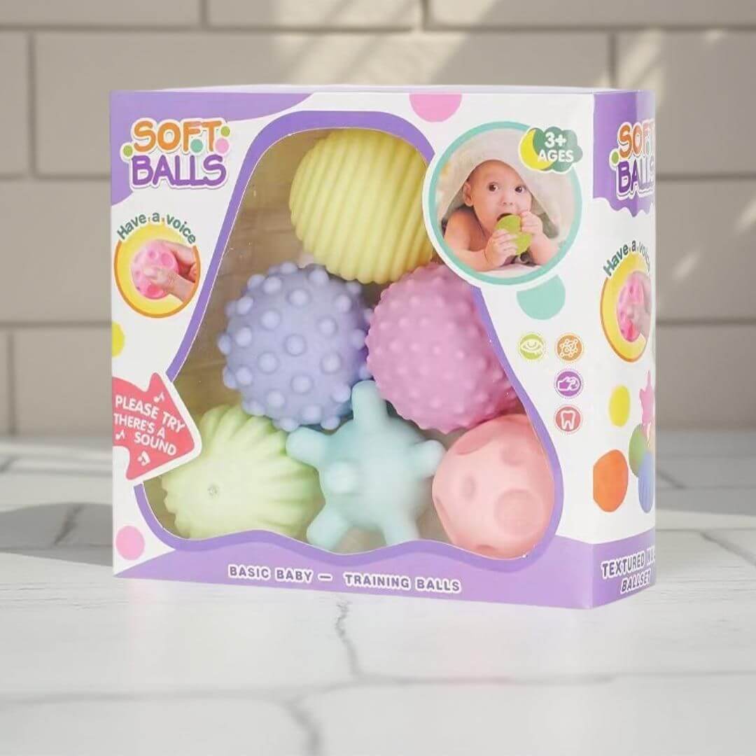 La Balle sensorielle bébé | SoftBalls™ en couleurs chaudes