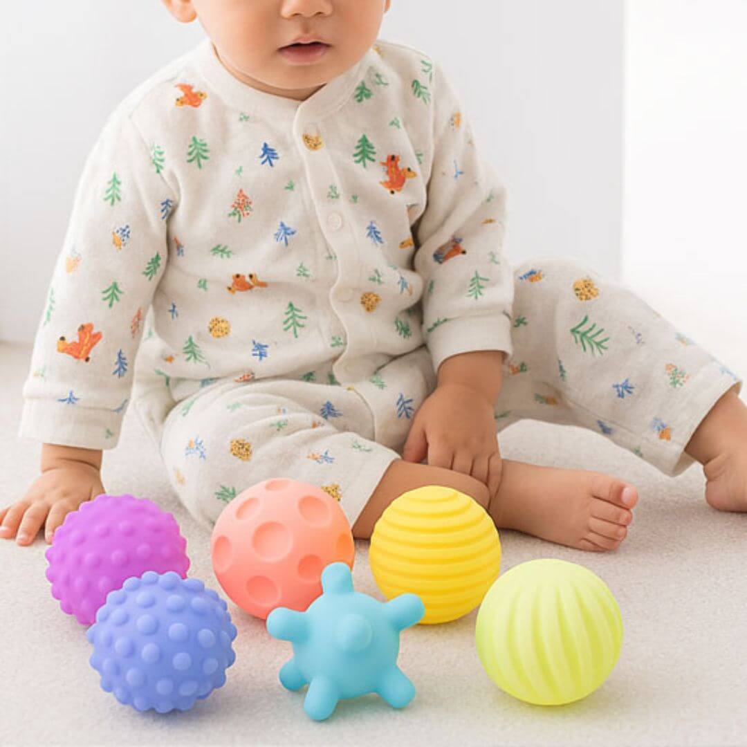 La Balle sensorielle bébé | SoftBalls™ en couleurs