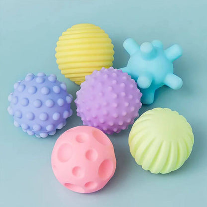 La Balle sensorielle bébé | SoftBalls™ en 6 formes différentes