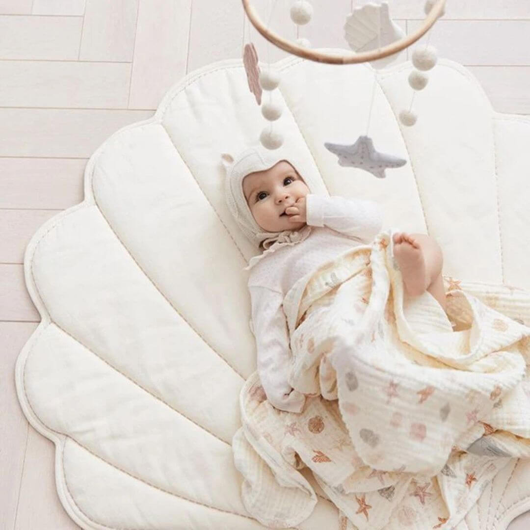 Tapis-d'éveil-Coquille-bébé-sur-le-dos