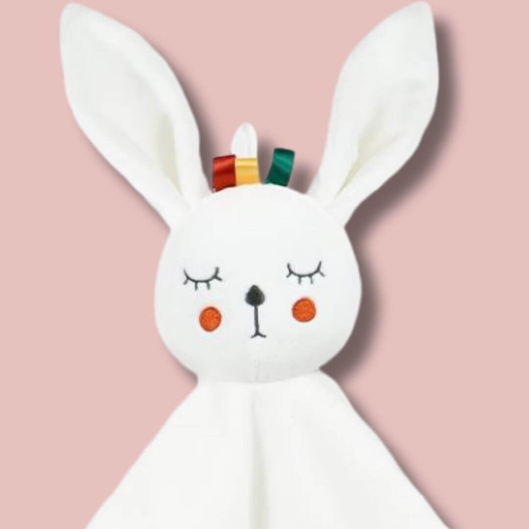 Doudou bébé fille — lion en hochet avec de belles couleurs