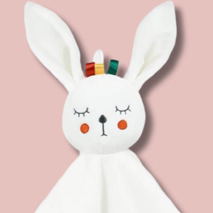 Doudou bébé fille — lion en hochet avec de belles couleurs